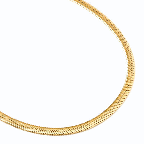 Close up of the 4mm width 18k gold plated herringbone necklace showing the herringbone zig zag structure