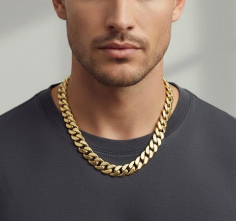 Man wearing a B.Tiff C160G 16mm 18k gold plated Cuban chain necklace against a neutral background