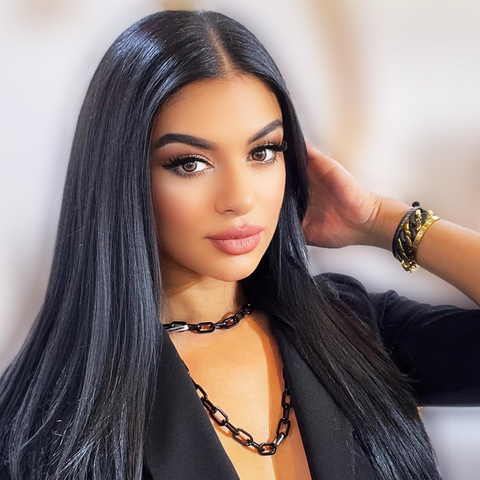 Female model wearing B.Tiff C200B Paperclip link chain necklace and B.Tiff bangle BG004B, BG808G, and B.TIff bracelet BG160BG 16mm 2 tone gold and black Cuban link chain bracelet