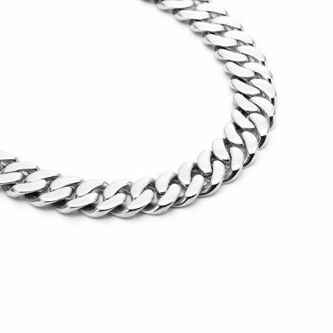 A B.Tiff C160W 16mm silver flat Cuban link chain necklace with a metallic sheen, displayed against a white background.