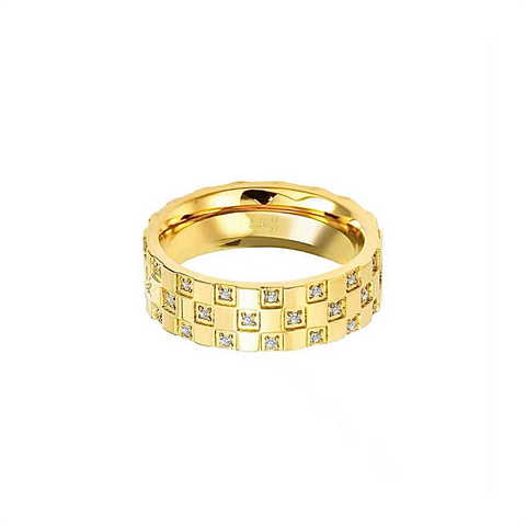 B.Tiff RG104G Trellis gold RING paved intricately with diamond alternatives made from high polish surgical stainless steel 18k gold plated laid on a white surface